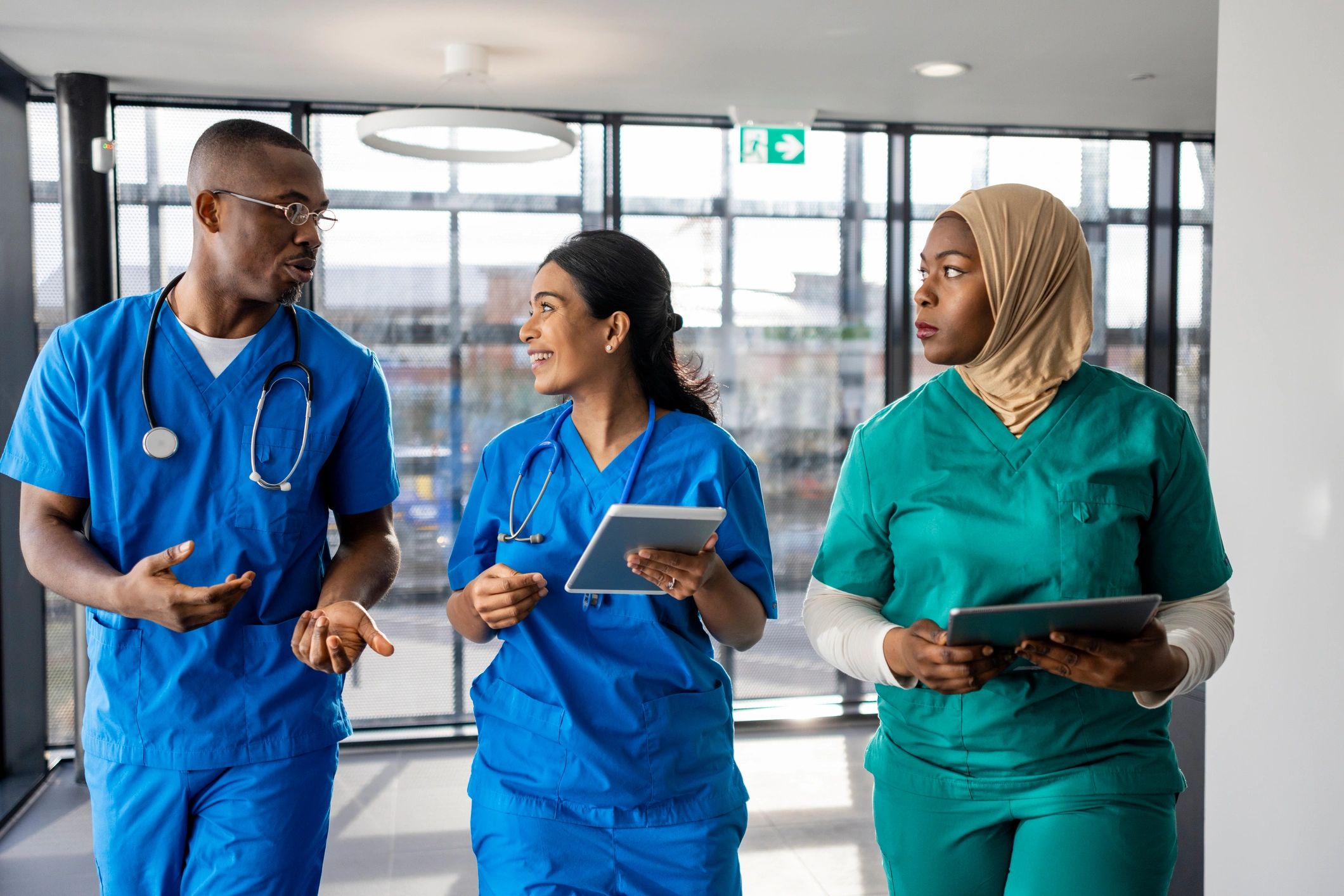 Medical staff in clinic corridor