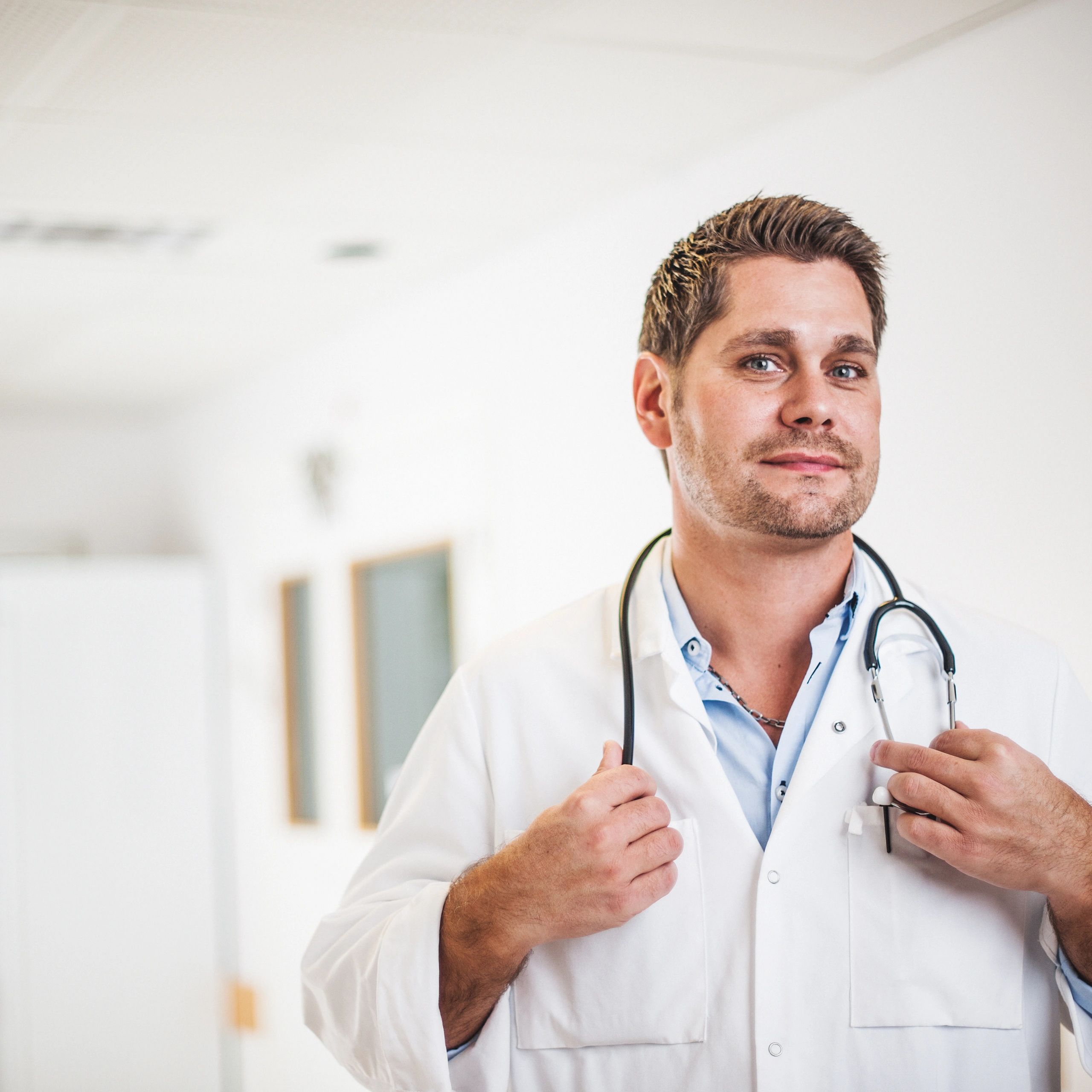 Doctor portrait in clinic corridor